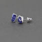 Silver stud earrings with Rough Tanzanite